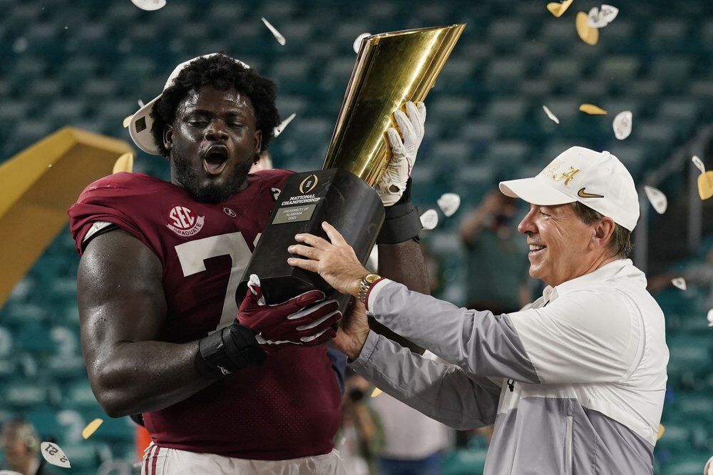 nick saban and alex leatherwood 1-12-21 ap.jpeg
